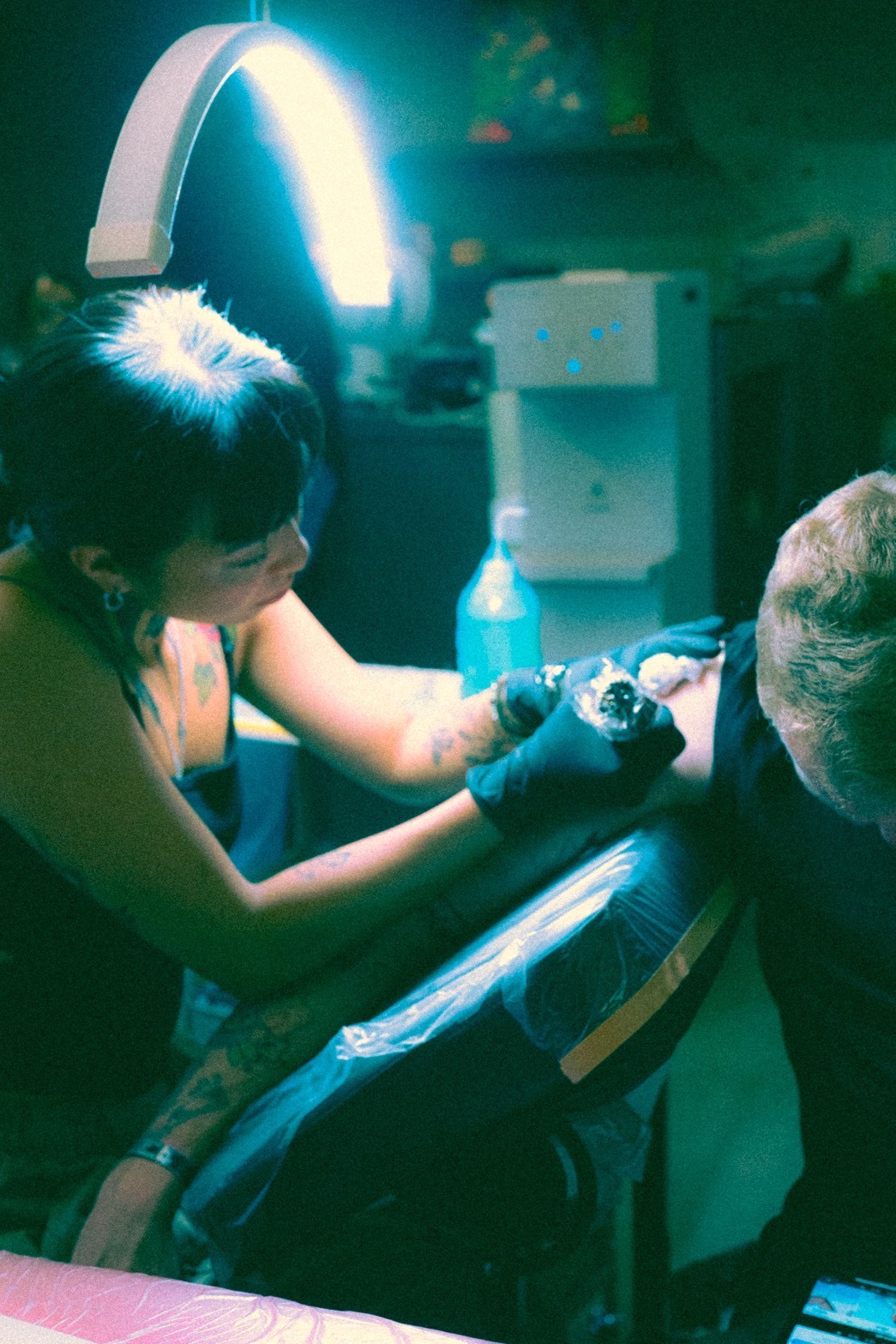 Kiko, owner and tattoo artist at Third Eye Studio, at work